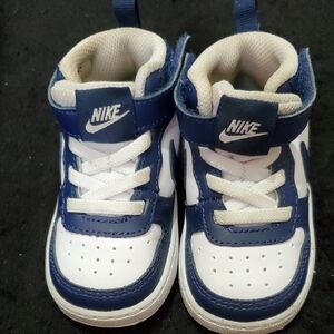 Nike Blue and White Sneakers with Classic Design